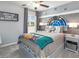 Nicely decorated bedroom with a Star Wars theme featuring carpet and natural light at 6926 161St E Ter, Parrish, FL 34219