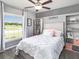 Bright bedroom features carpet, neutral colors, a ceiling fan and ample shelving at 6926 161St E Ter, Parrish, FL 34219
