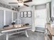Office space featuring natural light, ceiling fan and a wooden desk with decor at 6926 161St E Ter, Parrish, FL 34219