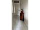 Tiled entryway with decorative table at 704 Queens Ct, Seffner, FL 33584