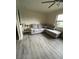 Inviting living room featuring a comfortable sectional sofa and stylish decor elements at 704 Queens Ct, Seffner, FL 33584