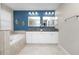 Well-lit bathroom with double vanity, granite counters, and a separate tub at 1044 Oliveto Verdi Ct, Brandon, FL 33511