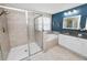 Updated bathroom featuring a glass-enclosed shower and a deep soaking tub at 1044 Oliveto Verdi Ct, Brandon, FL 33511