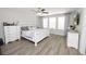 Spacious bedroom with three windows, neutral colors, and plenty of natural light at 1044 Oliveto Verdi Ct, Brandon, FL 33511