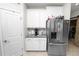 Bright eat-in kitchen with stainless steel refrigerator and lots of cabinets at 1044 Oliveto Verdi Ct, Brandon, FL 33511