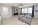 Comfortable living area with a stylish fireplace and entertainment center at 1044 Oliveto Verdi Ct, Brandon, FL 33511