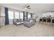 Bright living room area with a spacious layout, open to kitchen and dining area at 1044 Oliveto Verdi Ct, Brandon, FL 33511