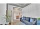 Comfortable living area with a neutral color palette, plush seating, and stylish decor at 11825 Frost Aster Dr, Riverview, FL 33579