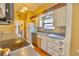 Bright kitchen featuring stainless steel appliances, and ample counter space at 12212 Hidden Brook Dr, Tampa, FL 33624