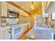 Well-equipped kitchen with plentiful cabinet space and modern appliances for culinary enthusiasts at 12212 Hidden Brook Dr, Tampa, FL 33624