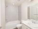 Clean bathroom with a shower-tub combo, bright lighting, and tile surround at 2572 58Th E Cir, Palmetto, FL 34221