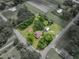 Property aerial view showcasing the expansive lot and landscaping within defined property lines at 2802 Midway Rd, Plant City, FL 33565