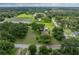 Scenic aerial view of the property, surrounded by picturesque landscape and open fields at 2802 Midway Rd, Plant City, FL 33565