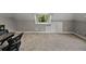 Attic space featuring carpeted floors, closet space, and dormer windows at 2802 Midway Rd, Plant City, FL 33565