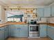 Kitchen with custom cabinets, butcher block countertops and stainless steel oven at 2802 Midway Rd, Plant City, FL 33565