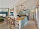 Bright open kitchen featuring custom cabinets, butcher block countertops and stainless steel appliances at 2802 Midway Rd, Plant City, FL 33565