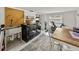 Functional laundry room with modern appliances, sink and exercise equipment at 2802 Midway Rd, Plant City, FL 33565