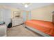 Bright bedroom with bedside table, large bed, and soft carpet at 2815 Kebs Ln, Plant City, FL 33565