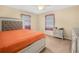 Cozy bedroom with large bed, neutral-toned walls, and soft carpet at 2815 Kebs Ln, Plant City, FL 33565