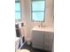 Modern bathroom with stylish vanity, updated fixtures, and a clean, bright design at 4718 Crystal Ave, Sarasota, FL 34231