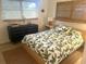 Inviting bedroom featuring a cozy bed, natural light, and stylish furnishings at 4718 Crystal Ave, Sarasota, FL 34231