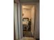 A glimpse of the cozy bedroom, adorned with a starfish-themed quilt, captures a tranquil sleeping space at 7713 39Th N Ave, St Petersburg, FL 33709