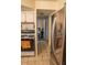 Convenient kitchen with easy access to the bedroom, featuring practical appliances at 7713 39Th N Ave, St Petersburg, FL 33709