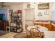 The kitchen is equipped with essential appliances and a dining area with a cozy ambiance at 7713 39Th N Ave, St Petersburg, FL 33709