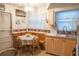 Bright kitchen featuring an eat-in nook, ample sunlight, and functional design at 7713 39Th N Ave, St Petersburg, FL 33709