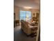 Comfortable living room showcasing a plush reclining sofa and armchairs, perfect for relaxation at 7713 39Th N Ave, St Petersburg, FL 33709