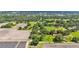 Scenic aerial view of a countryside property surrounded by green fields and tree lines at 1309 Joe Mcintosh Rd, Plant City, FL 33565