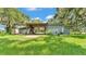 Exterior of barn showing large opening that leads to the rest of the property at 1309 Joe Mcintosh Rd, Plant City, FL 33565