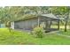 A screened outdoor patio with open views of the surrounding landscape at 1309 Joe Mcintosh Rd, Plant City, FL 33565