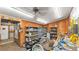 A view of the inside workshop with storage shelves and workbench at 1309 Joe Mcintosh Rd, Plant City, FL 33565