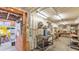 A view of the cluttered interior of the workshop and storage container at 1309 Joe Mcintosh Rd, Plant City, FL 33565