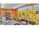 Organized workshop with plywood walls, a yellow workbench, tools, and plenty of storage space at 1309 Joe Mcintosh Rd, Plant City, FL 33565