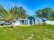 Lovely home with solar panels, a two-car garage, and mature landscaping for added curb appeal at 173 Portland Ave, Spring Hill, FL 34606