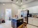 Open-concept kitchen featuring an island and stainless steel appliances at 173 Portland Ave, Spring Hill, FL 34606