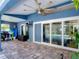 Covered patio with tile flooring and views of the pool area at 173 Portland Ave, Spring Hill, FL 34606