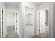 Hallway showing bedroom and bathroom doors at 2633 Keysville Dr, Lithia, FL 33547