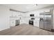 Bright, modern kitchen boasting new appliances, sleek white cabinets, and ample counter space at 2633 Keysville Dr, Lithia, FL 33547
