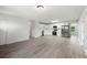 Bright, open-concept kitchen with stainless steel appliances, white cabinets, and durable floors at 2633 Keysville Dr, Lithia, FL 33547