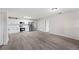 Open-concept kitchen featuring stainless steel appliances and bright flooring at 2633 Keysville Dr, Lithia, FL 33547