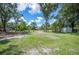 Expansive lot featuring lush grass and scattered trees for a serene, nature-filled setting at 2633 Keysville Dr, Lithia, FL 33547