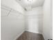 Functional walk-in closet with wire shelving, maximizing storage space at 2633 Keysville Dr, Lithia, FL 33547
