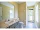 The bathroom has neutral walls, linoleum flooring and a vanity with drawers at 3730 Ralston Rd, Plant City, FL 33566