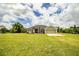 Charming single-story home with a well-manicured lawn and attached two-car garage at 3730 Ralston Rd, Plant City, FL 33566