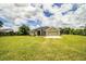 Charming single-story home with a well-manicured lawn and attached two-car garage at 3730 Ralston Rd, Plant City, FL 33566