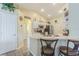 Bright kitchen with barstool seating, stainless appliances, and plenty of counter space for meal preparation at 4223 Amber Ridge Ln, Valrico, FL 33594
