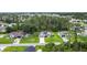 Aerial view of the property and nearby homes displaying neighborhood layout and landscaping at 4592 Crabapple Ave, North Port, FL 34287